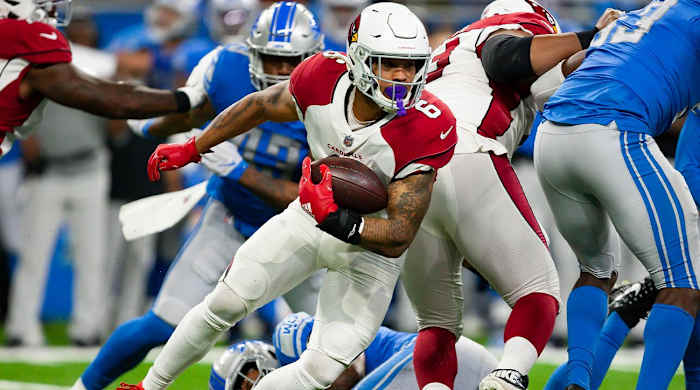 Dec 19, 2021; Detroit, Michigan, USA; Arizona Cardinals running back James Conner (6) runs the ball during the second quarter against the Detroit Lions at Ford Field.